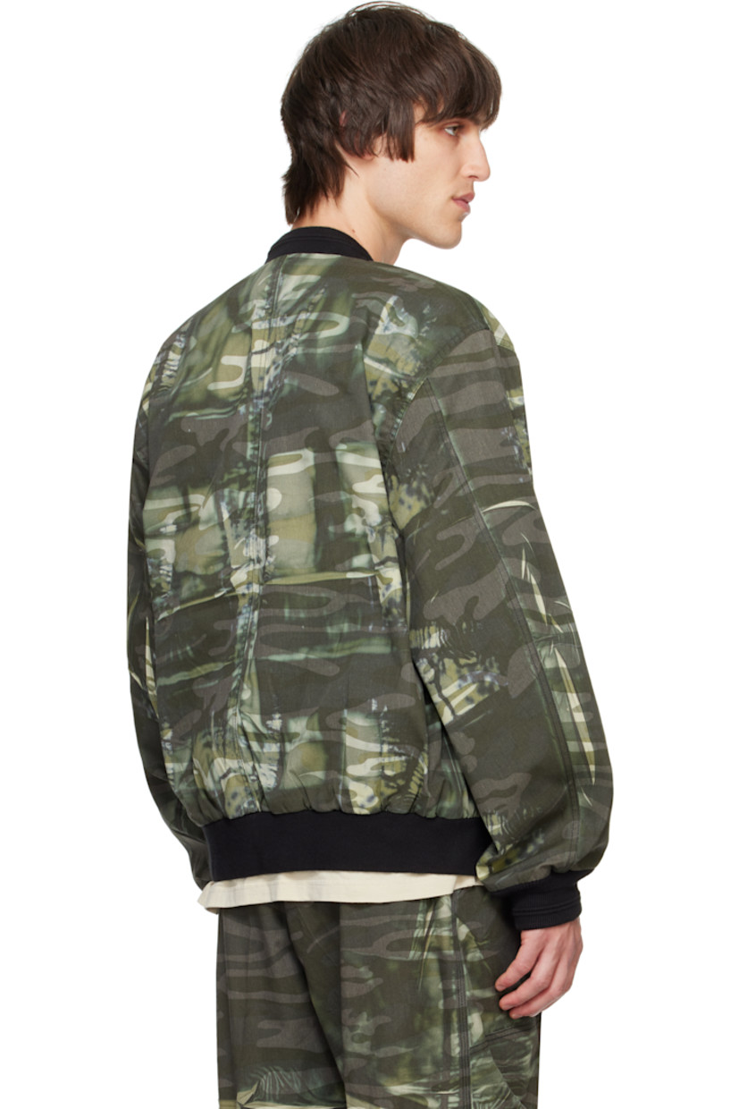 Polyester- and cotton-blend twill bomber jacket. Bleached effect and camouflage pattern printed throughout. 

· Rib-knit stand collar, hem, and cuffs
· Two-way zip closure
· Flap and welt pockets 
· Dropped shoulders
· Logo embroidered at sleeve
· Patch pocket at interior
· Fully lined

Supplier color: Green