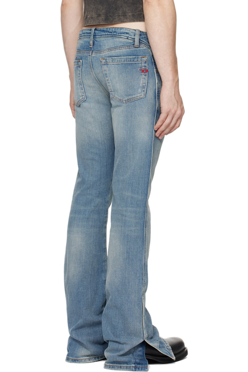 Non-stretch denim jeans. Fading and distressing throughout.

· Belt loops
· Five-pocket styling
· Button-fly
· Logo patch at coin pocket
· Vented cuffs 
· Logo embroidered at back pocket
· Logo-engraved silver-tone hardware
· Contrast stitching in tan

Supplier color: Light blue