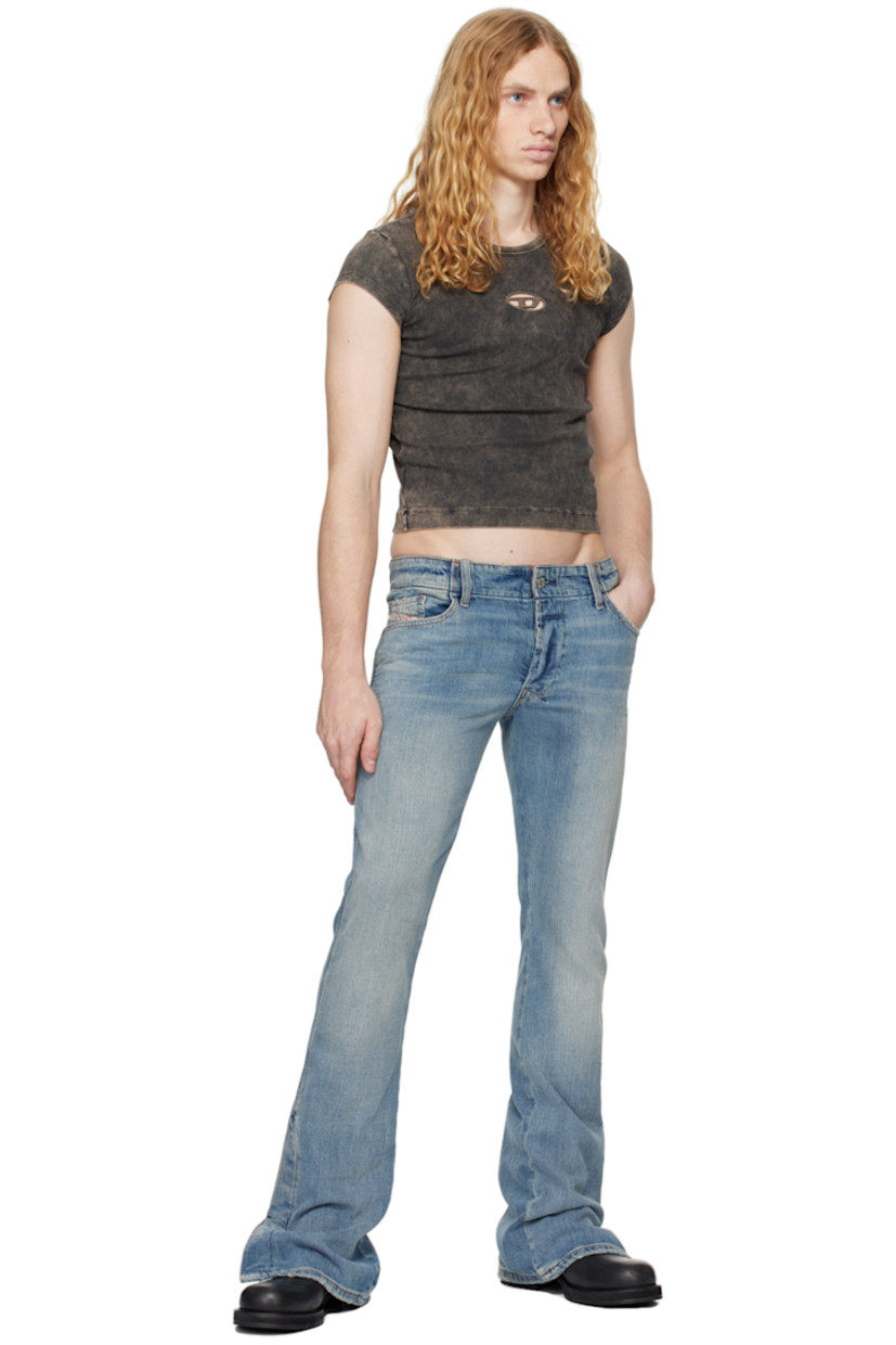 Non-stretch denim jeans. Fading and distressing throughout.

· Belt loops
· Five-pocket styling
· Button-fly
· Logo patch at coin pocket
· Vented cuffs 
· Logo embroidered at back pocket
· Logo-engraved silver-tone hardware
· Contrast stitching in tan

Supplier color: Light blue