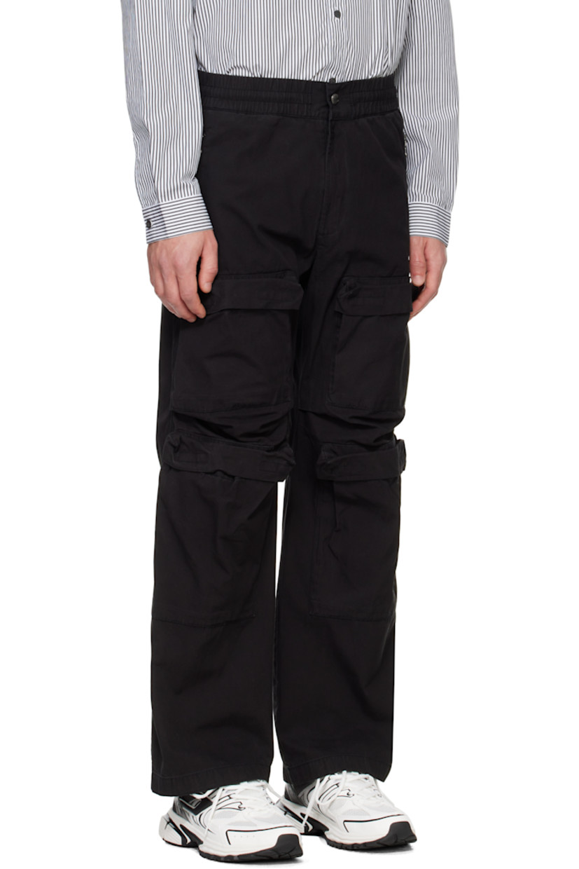 Cotton twill cargo pants. 

· Concealed drawstring at elasticized waistband
· Four-pocket styling
· Zip-fly
· Bellows pockets at legs
· Zip vent at cuffs 
· Logo embroidered at back
· Logo-engraved antiqued silver-tone hardware

Supplier color: Black