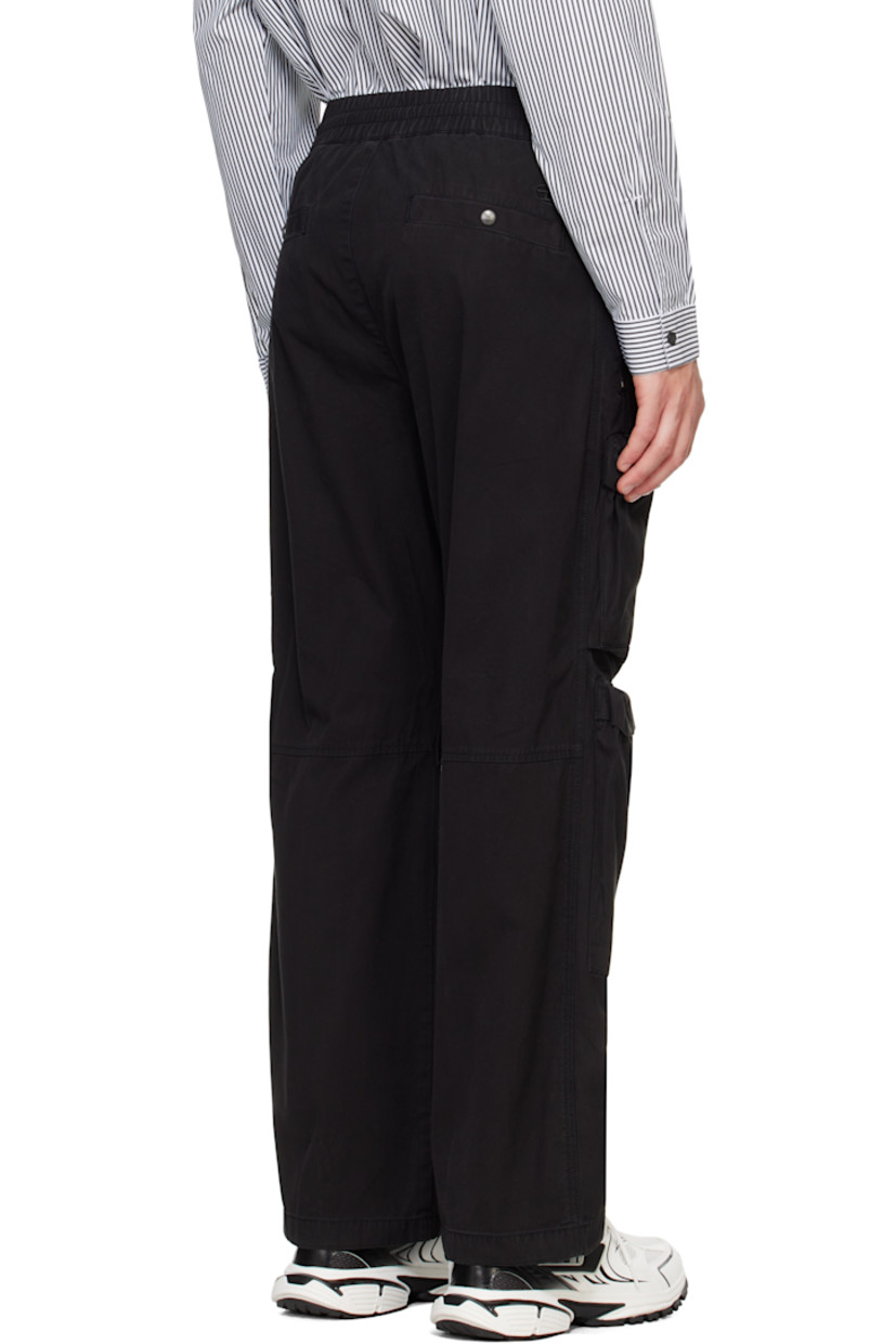 Cotton twill cargo pants. 

· Concealed drawstring at elasticized waistband
· Four-pocket styling
· Zip-fly
· Bellows pockets at legs
· Zip vent at cuffs 
· Logo embroidered at back
· Logo-engraved antiqued silver-tone hardware

Supplier color: Black