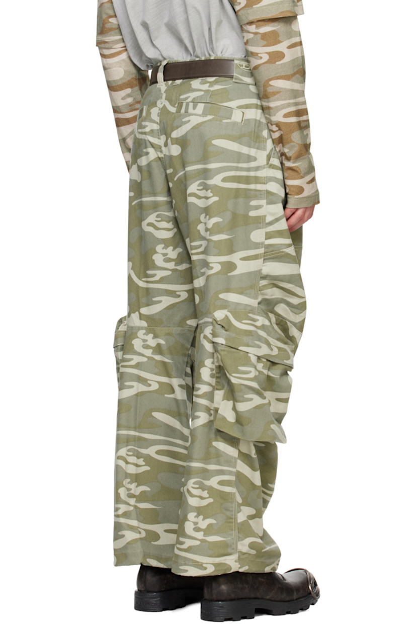 Polyester- and cotton-blend twill cargo pants. Camouflage pattern printed throughout. 

· Paneled construction
· Belt loops
· Concealed drawstring at waistband
· Four-pocket styling
· Zip-fly
· Darts and draping at knees
· Concealed bungee-style drawstring at cuffs
· Cargo pocket at outseams 
· Embroidered logo patch at back waistband

Supplier color: Green