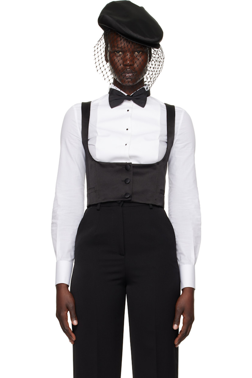 Stretch silk satin vest. Boning throughout.

· Scoop neck
· Button closure
· Mock welt pockets
· Partial stretch silk satin lining

Supplier color: Nero