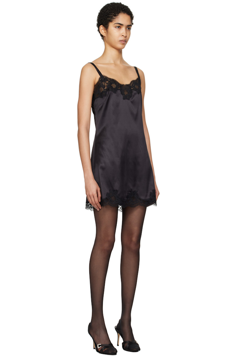 Stretch silk- and cotton-blend satin slip dress. Floral lace trim and raw edges throughout. 

· Sweetheart neck
· Darts at chest
· Fixed shoulder straps

Supplier color: Black