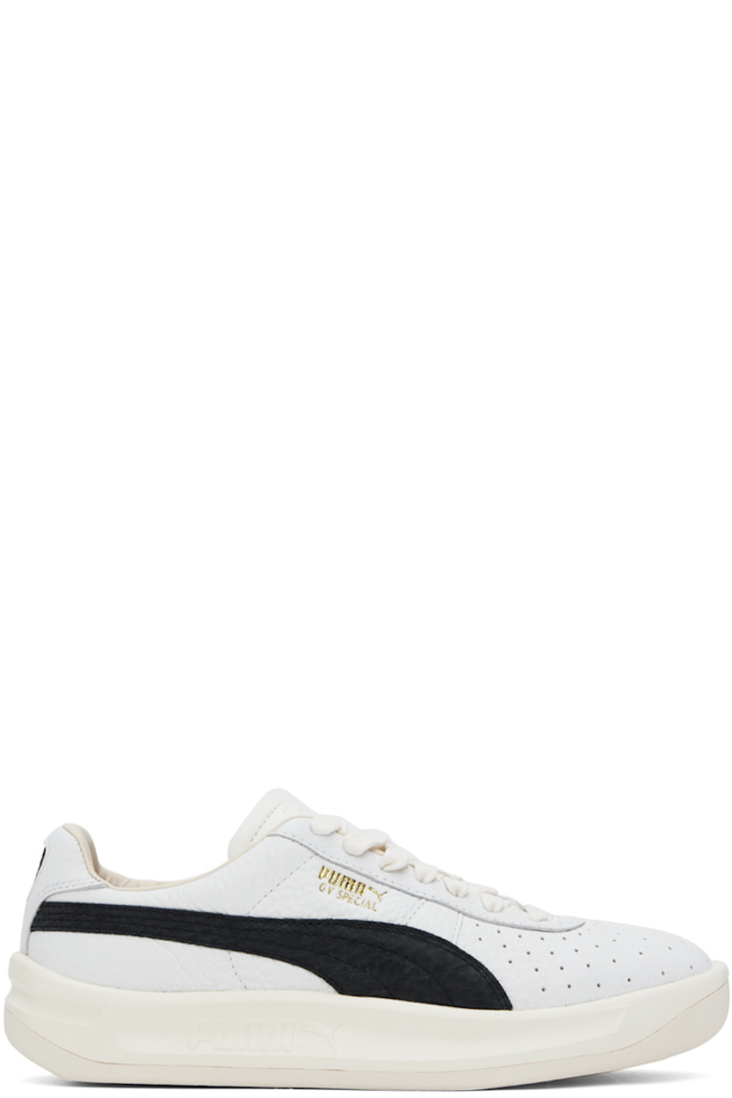 Low-top grained leather sneakers in white and black.

· Perforated detailing at toe
· Lace-up closure
· Logo embossed at padded tongue
· Padded collar
· Formstrip at sides
· Logo stamp at outer side and heel tab
· Buffed leather lining
· Logo embossed at outer midsole
· Treaded rubber sole

Supplier color: Puma white/Puma black