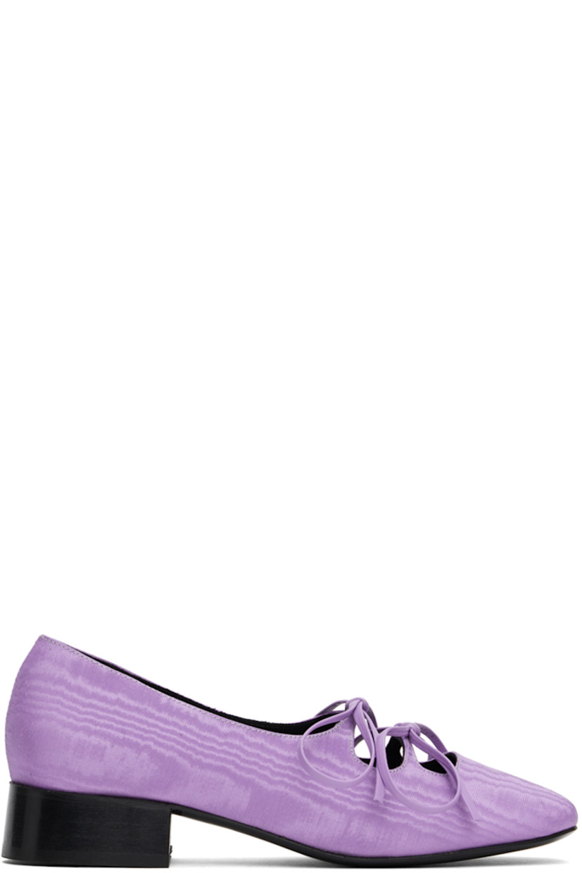 Handcrafted moiré ballerina flats in purple.

· Square toe
· Cutouts and bow accents at vamp
· Suede and buffed leather lining 
· Logo embossed at grained leather footbed
· Stacked leather block heel with rubber injection 
· Leather sole
· Heel: H1.25"

Supplier color: Lilac