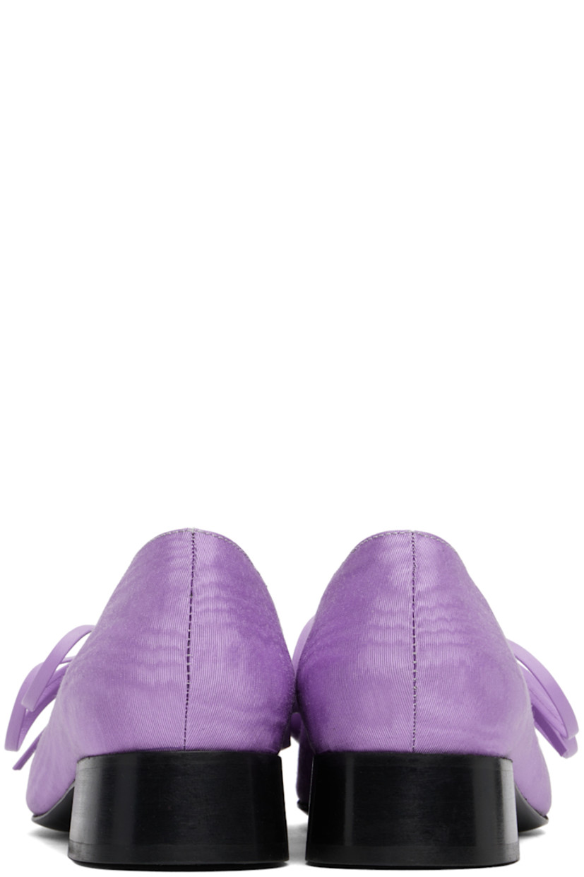 Handcrafted moiré ballerina flats in purple.

· Square toe
· Cutouts and bow accents at vamp
· Suede and buffed leather lining 
· Logo embossed at grained leather footbed
· Stacked leather block heel with rubber injection 
· Leather sole
· Heel: H1.25"

Supplier color: Lilac