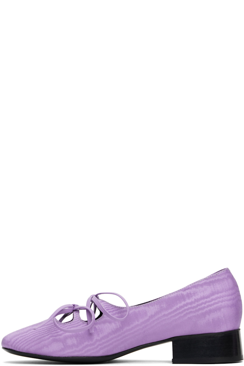 Handcrafted moiré ballerina flats in purple.

· Square toe
· Cutouts and bow accents at vamp
· Suede and buffed leather lining 
· Logo embossed at grained leather footbed
· Stacked leather block heel with rubber injection 
· Leather sole
· Heel: H1.25"

Supplier color: Lilac
