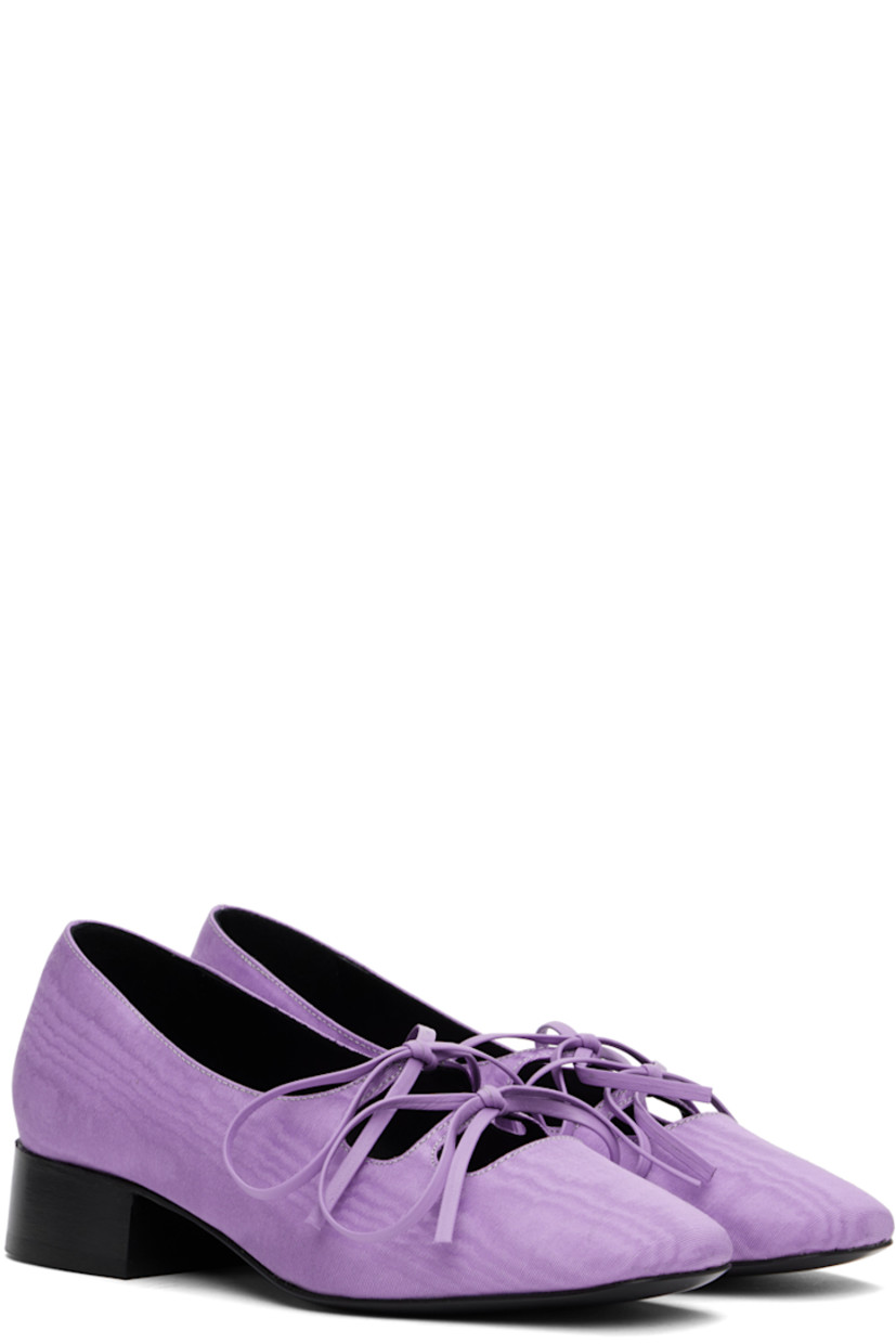 Handcrafted moiré ballerina flats in purple.

· Square toe
· Cutouts and bow accents at vamp
· Suede and buffed leather lining 
· Logo embossed at grained leather footbed
· Stacked leather block heel with rubber injection 
· Leather sole
· Heel: H1.25"

Supplier color: Lilac