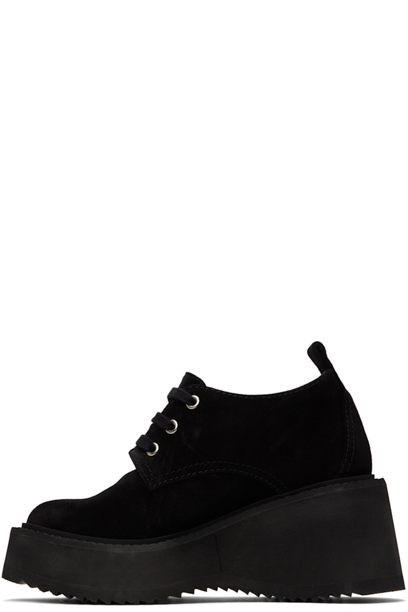 Suede heeled derbys in black.

· Lace-up closure
· Pull-tab at heel
· Logo printed at padded leather footbed
· Buffed leather lining
· Foam rubber platform midsole and wedge heel 
· Treaded rubber sole
· Platform: H1.5"
· Heel: H3"

Supplier color: Black