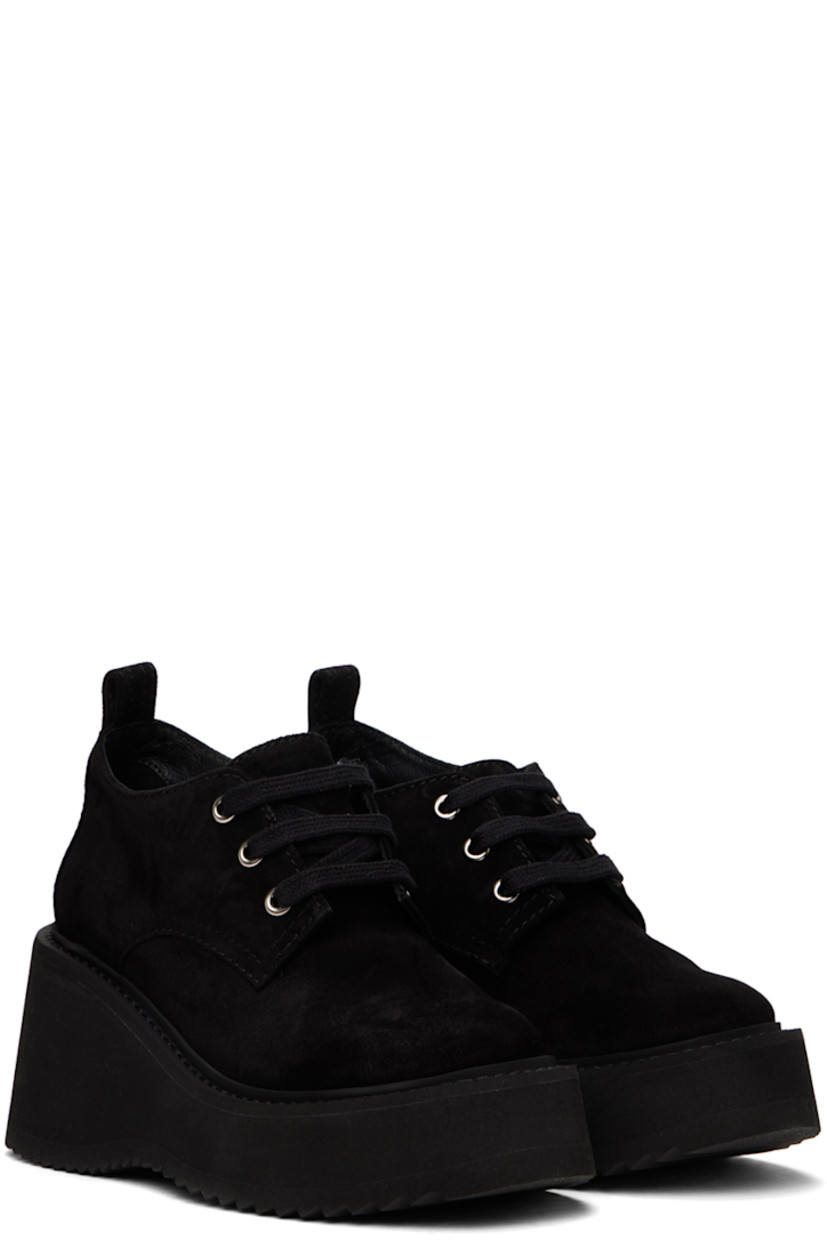 Suede heeled derbys in black.

· Lace-up closure
· Pull-tab at heel
· Logo printed at padded leather footbed
· Buffed leather lining
· Foam rubber platform midsole and wedge heel 
· Treaded rubber sole
· Platform: H1.5"
· Heel: H3"

Supplier color: Black