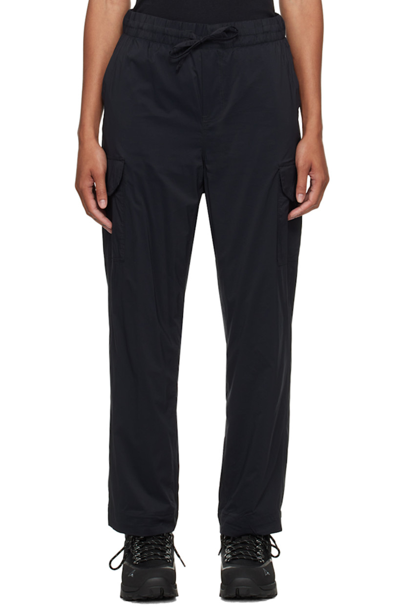 Nylon ripstop trousers. 

· Drawstring at elasticized waistband
· Three-pocket styling
· Mock-fly
· Cargo pocket at outseams
· Embroidered logo patch at back
· Full mesh lining

Supplier color: Black