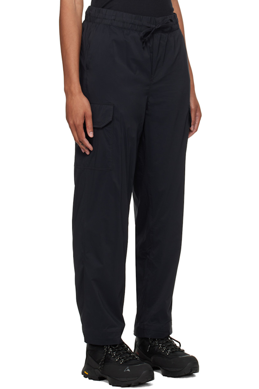 Nylon ripstop trousers. 

· Drawstring at elasticized waistband
· Three-pocket styling
· Mock-fly
· Cargo pocket at outseams
· Embroidered logo patch at back
· Full mesh lining

Supplier color: Black