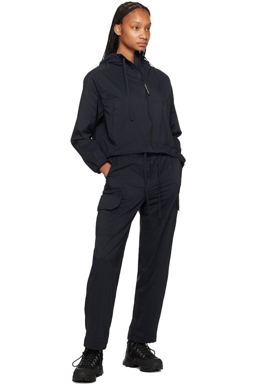 Nylon ripstop trousers. 

· Drawstring at elasticized waistband
· Three-pocket styling
· Mock-fly
· Cargo pocket at outseams
· Embroidered logo patch at back
· Full mesh lining

Supplier color: Black