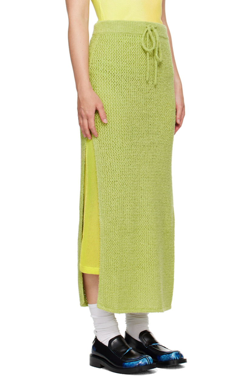 Open knit mulberry silk bouclé skirt. 

· Drawstring at elasticized rib knit waistband
· Vent at side seams
· Unlined

Supplier color: Wasabi