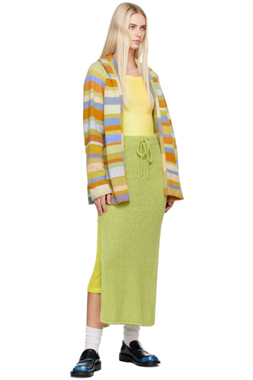 Open knit mulberry silk bouclé skirt. 

· Drawstring at elasticized rib knit waistband
· Vent at side seams
· Unlined

Supplier color: Wasabi