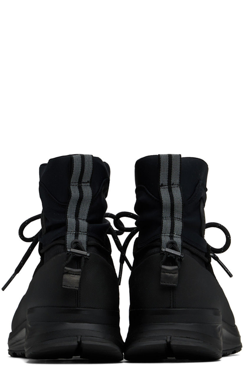 High-top paneled ripstop, suede, and jersey sneakers in black.

· Waterproof
· Lace-up closure
· Zip closure at vamp
· Cord-lock ankle drawstring
· Padded sock-style collar
· Rubberized logo patch at outer side
· Reflective pull-loop at heel collar
· HDry® jersey lining
· Microfibre onSteam® footbed
· Rubber heel stabilizer at foam rubber midsole
· Treaded rubber sole

Supplier color: Black