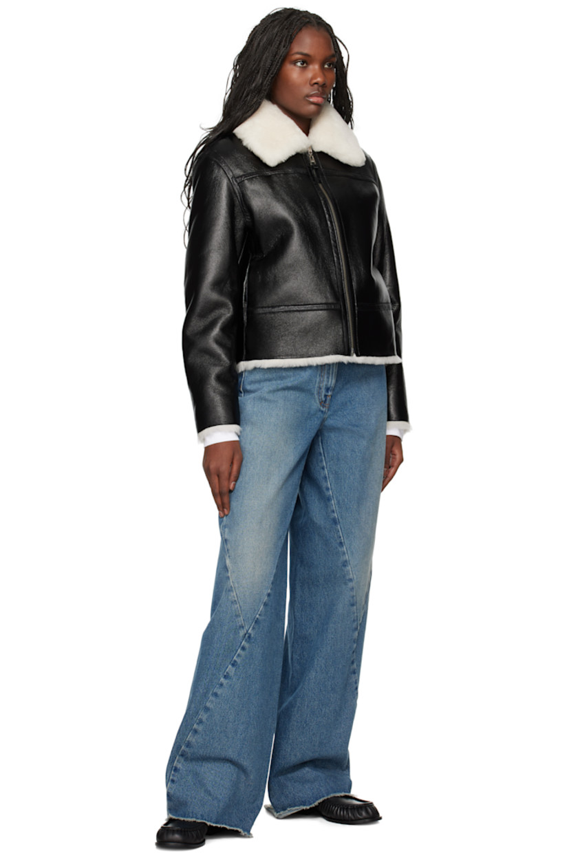Reversible grained sheepskin jacket. 

Reverse in white shearling. 

· Rated: -15ºC
· Paneled construction 
· Spread collar
· Zip closure
· Seam pockets
· Logo-embossed locker loop at back collar

Supplier color: Black/Natural
