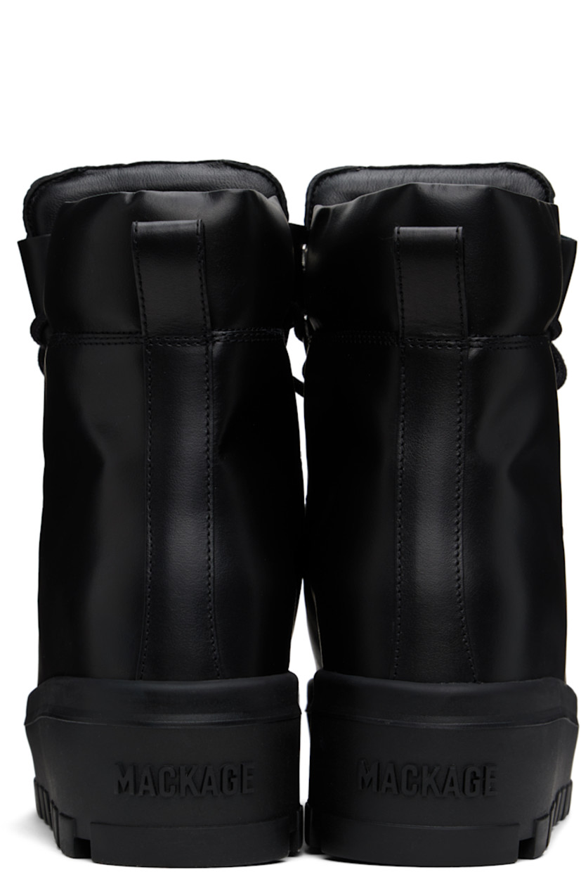 Ankle-high handcrafted buffed leather boots in black.

· Water-repellent  
· Lace-up closure
· Logo embossed at padded layered tongue 
· Padded collar
· Pull-loop at heel collar
· Grained leather lining
· Logo embossed at heel
· Lugged rubber platform sole
· Platform: H2"

Supplier color: Black