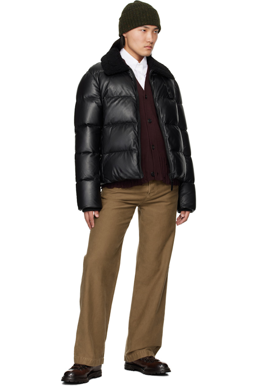 Recycled down-filled and quilted buffed lambskin jacket.

· GRS-certified down
· Rated: -15°C
· Water-repellent
· Press-stud tab at shearling spread collar
· Zip closure
· Logo embossed at chest
· Zip seam pockets
· Inset rib-knit cuffs
· Locker loop at back collar
· Full recycled nylon laqué lining

Supplier color: Black

Fill: 80% recycled down, 20% recycled waterfowl feathers.