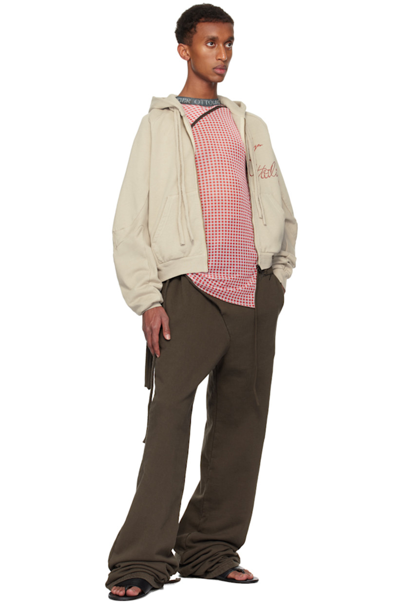 Organic cotton fleece hoodie.

· Drawstring at hood
· Zip closure
· Printed logo and crystal-cut appliqués at front
· Patch pockets
· Rib-knit hem and cuffs
· Raglan sleeves

Supplier color: Sand pebble