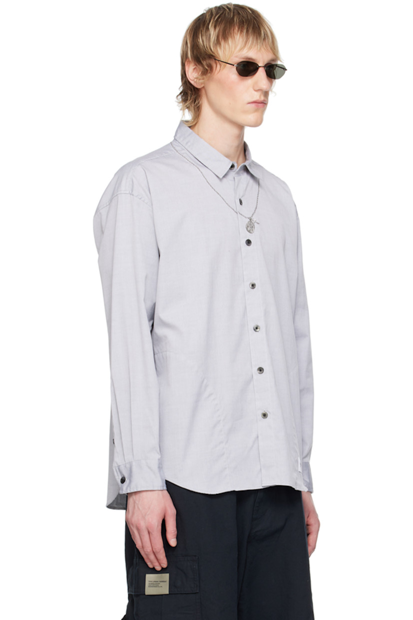 Cotton oxford cloth shirt. 

· Graphic embroidered at spread collar
· Button closure
· Logo patch at shirttail hem
· Seam pockets
· Logo flag at side seam
· Single-button barrel cuffs
· Box pleat at back yoke
· Logo-engraved hardware

Supplier color: Black