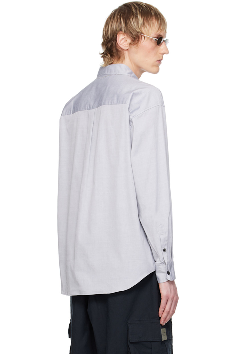 Cotton oxford cloth shirt. 

· Graphic embroidered at spread collar
· Button closure
· Logo patch at shirttail hem
· Seam pockets
· Logo flag at side seam
· Single-button barrel cuffs
· Box pleat at back yoke
· Logo-engraved hardware

Supplier color: Black
