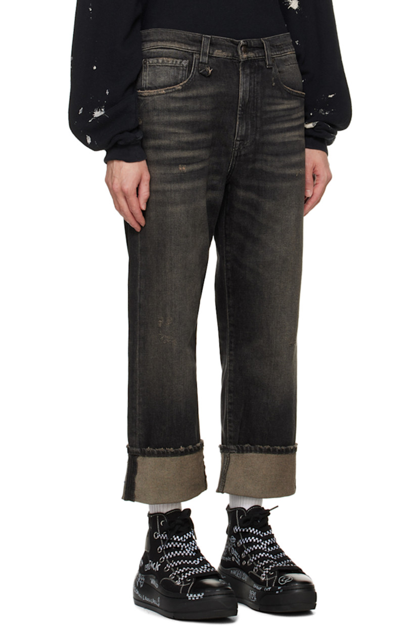 Stretch denim jeans. Fading, whiskering, and subtle distressing throughout. 

· Belt loops
· Five-pocket styling
· Zip-fly
· Leather logo patch at back waistband
· Logo embroidered at back pocket
· Logo-engraved gunmetal-tone hardware

Supplier color: Abbey black