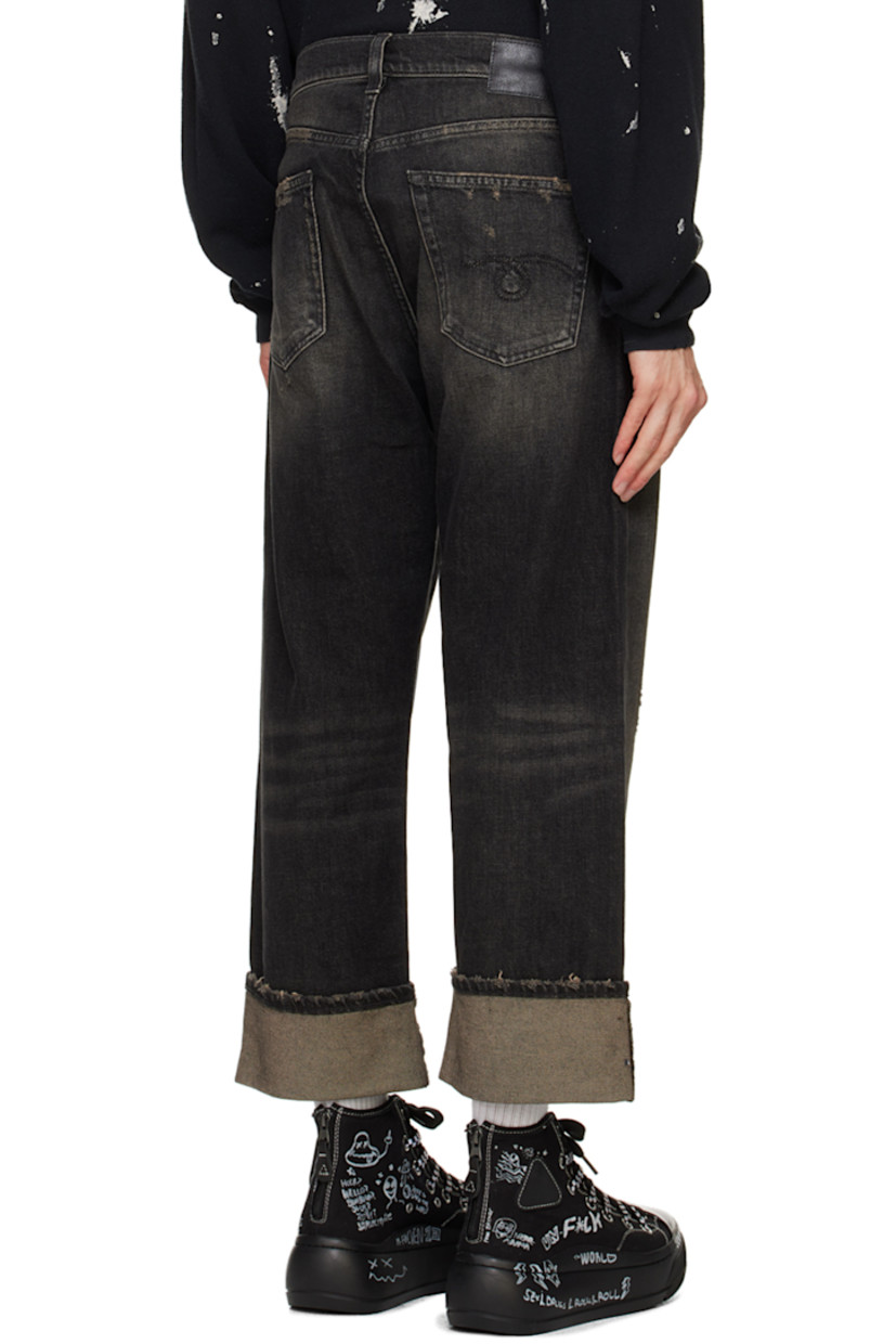 Stretch denim jeans. Fading, whiskering, and subtle distressing throughout. 

· Belt loops
· Five-pocket styling
· Zip-fly
· Leather logo patch at back waistband
· Logo embroidered at back pocket
· Logo-engraved gunmetal-tone hardware

Supplier color: Abbey black
