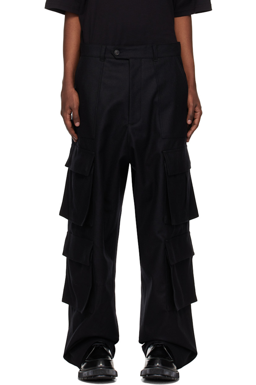 Wool flannel cargo pants.

· Paneled construction
· Belt loops
· Four-pocket styling
· Zip-fly
· Cargo pockets at outseams
· Horn hardware

Supplier color: Black