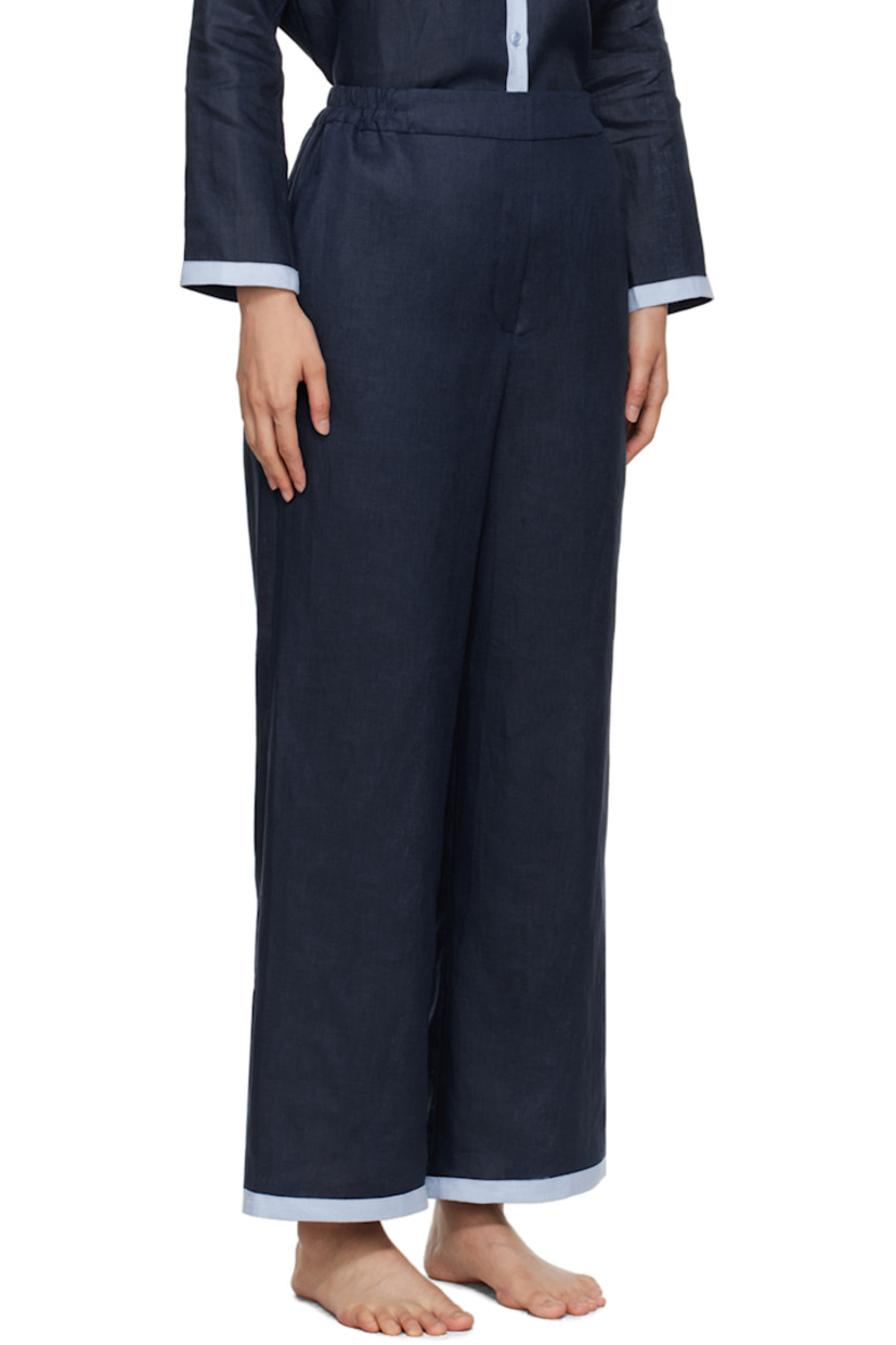 Relaxed-fit wide-leg linen hopsack trousers.

· High-rise
· Partially elasticized waistband
· Two-pocket styling
· Mock-fly
· Cropped cuffs

Supplier color: Navy