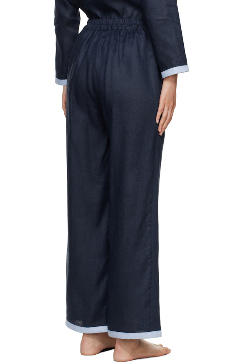 Relaxed-fit wide-leg linen hopsack trousers.

· High-rise
· Partially elasticized waistband
· Two-pocket styling
· Mock-fly
· Cropped cuffs

Supplier color: Navy