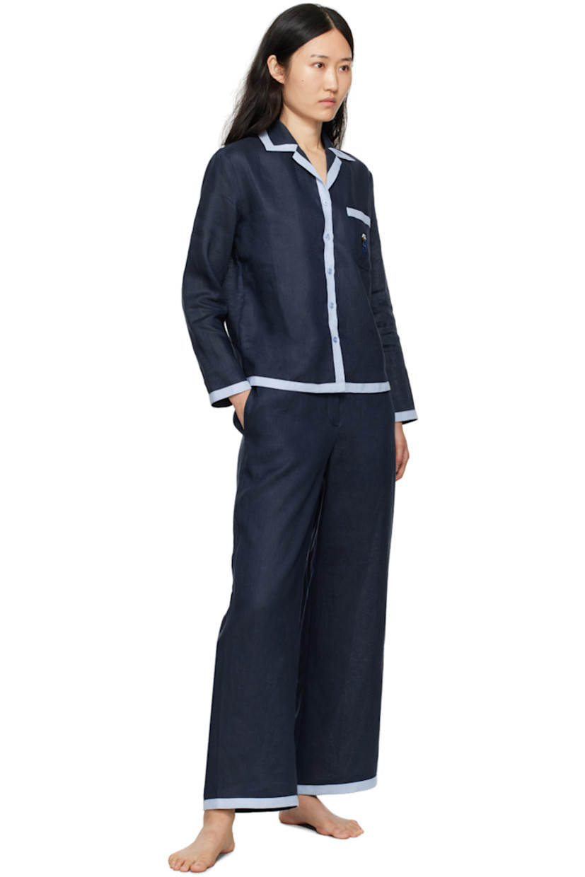 Relaxed-fit wide-leg linen hopsack trousers.

· High-rise
· Partially elasticized waistband
· Two-pocket styling
· Mock-fly
· Cropped cuffs

Supplier color: Navy