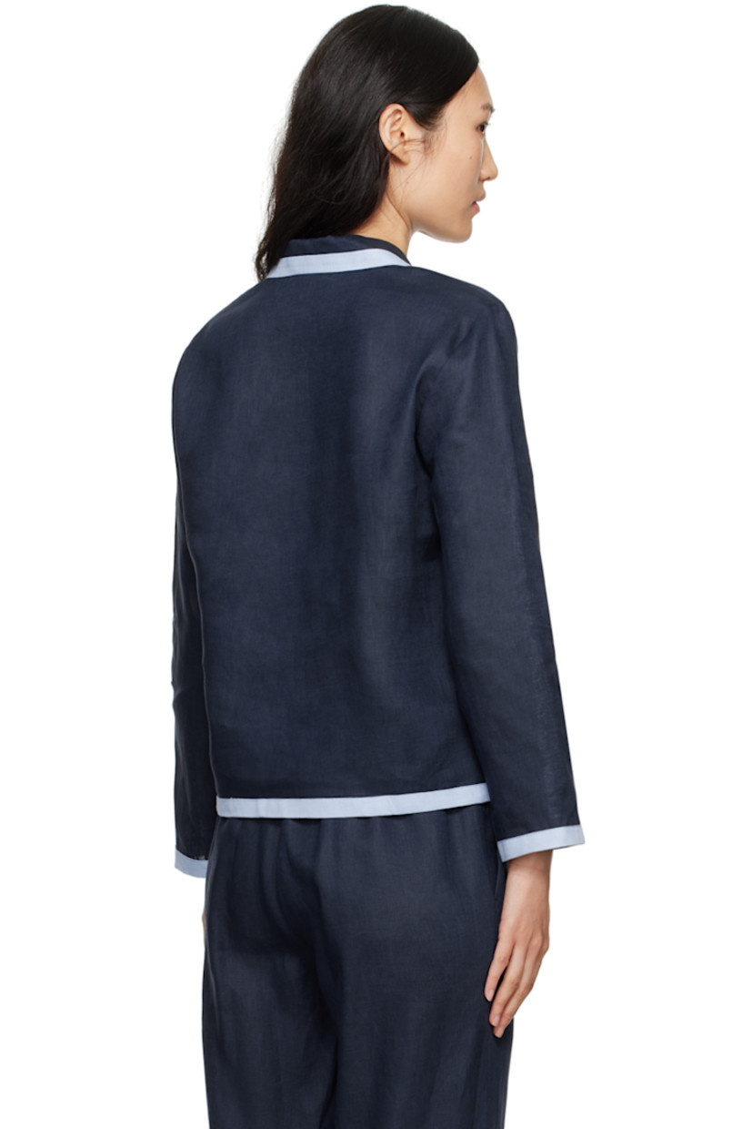 Relaxed-fit linen hopsack shirt.

· Camp collar
· Button closure
· Embroidered logo patch at patch pocket

Supplier color: Navy