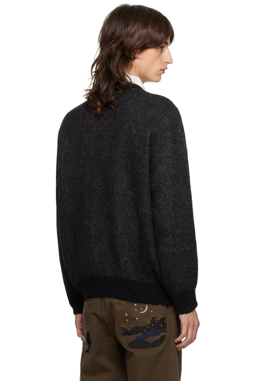 Brushed knit superfine alpaca- and recycled nylon-blend sweater.

· Rib knit crewneck, hem, and cuffs
· Jacquard text at chest

Supplier color: Black