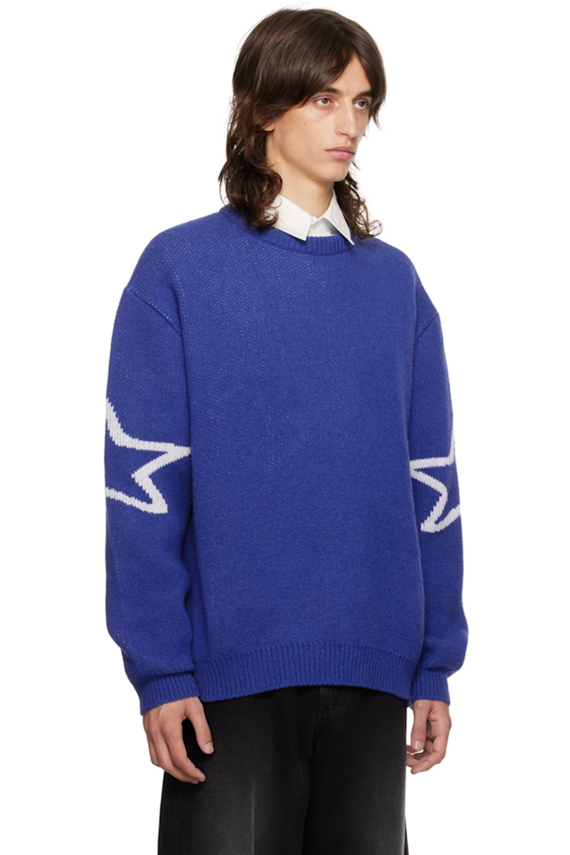 Knit wool- and recycled nylon-blend sweater.

· Jacquard text and graphics throughout
· Rib knit crewneck, hem, and cuffs

Supplier color: Blue