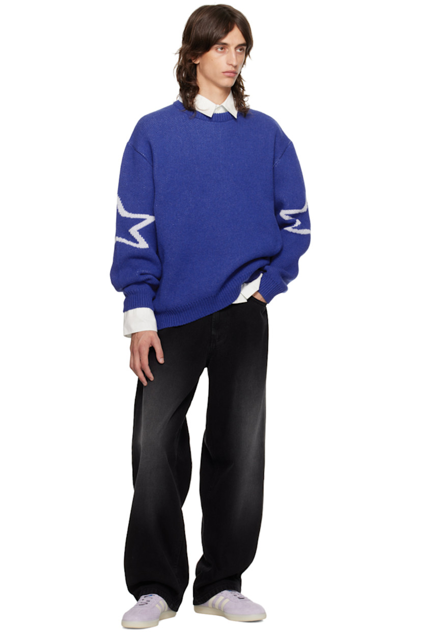 Knit wool- and recycled nylon-blend sweater.

· Jacquard text and graphics throughout
· Rib knit crewneck, hem, and cuffs

Supplier color: Blue
