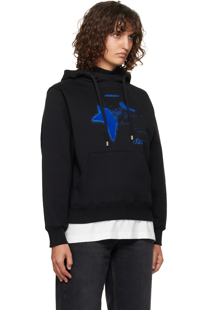 French terry hoodie. 

· Layered construction
· Inset rib-knit mock neck
· Drawstring at hood
· Logo graphic flocked at chest
· Kangaroo pocket
· Rib-knit hem and cuffs
· Dropped shoulders
· Pleat at back sleeves
· Button-style logo appliqués at back
· Logo-engraved silver-tone hardware

Supplier color: Noir
