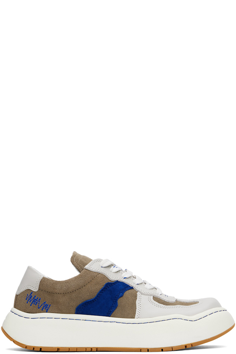 Low-top buffed leather and suede sneakers in gray.

· Lace-up closure
· Padded tongue and collar
· Logo embroidered at outer side
· Buffed leather lining
· Logo embossed at foam rubber midsole
· Treaded rubber sole

Supplier color: Grey