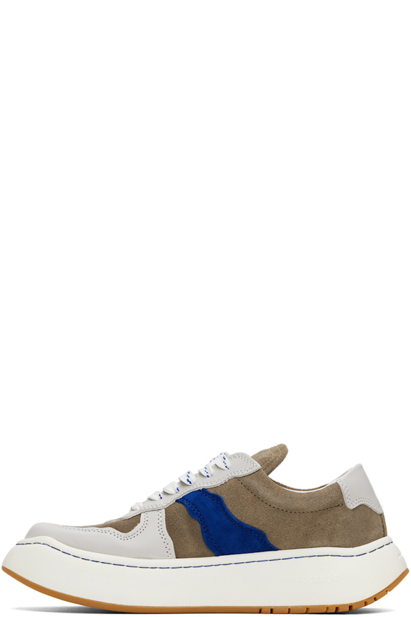 Low-top buffed leather and suede sneakers in gray.

· Lace-up closure
· Padded tongue and collar
· Logo embroidered at outer side
· Buffed leather lining
· Logo embossed at foam rubber midsole
· Treaded rubber sole

Supplier color: Grey
