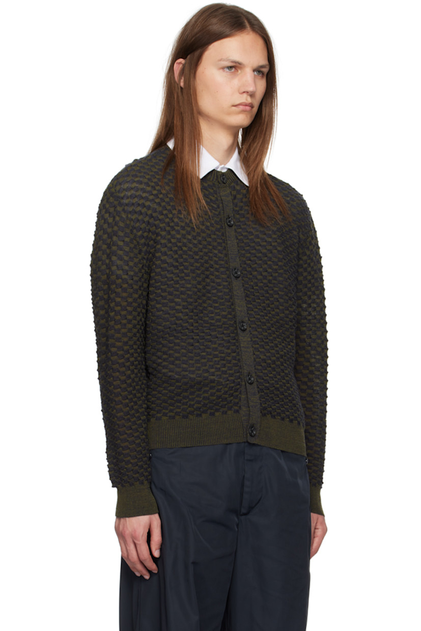 Textured knit wool cardigan.

· Rib knit crewneck, hem, and cuffs
· Button closure

Supplier color: Navy/Green