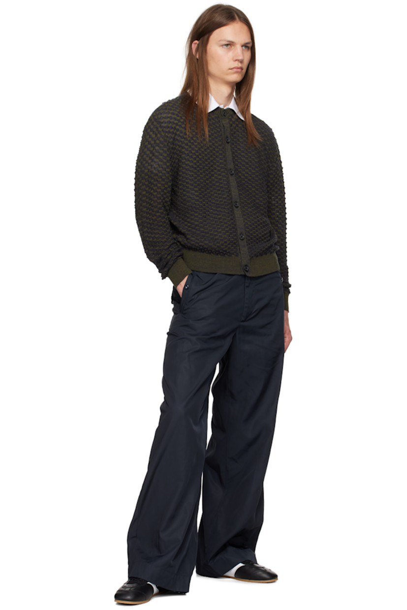 Textured knit wool cardigan.

· Rib knit crewneck, hem, and cuffs
· Button closure

Supplier color: Navy/Green