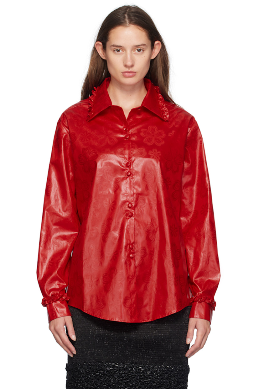 Hand-dyed bazin cotton damask shirt. Jacquard floral pattern throughout. 

· Ruffled trim at spread collar and cuffs
· Button closure
· Shirttail hem
· Single-button barrel cuffs

Supplier color: Red