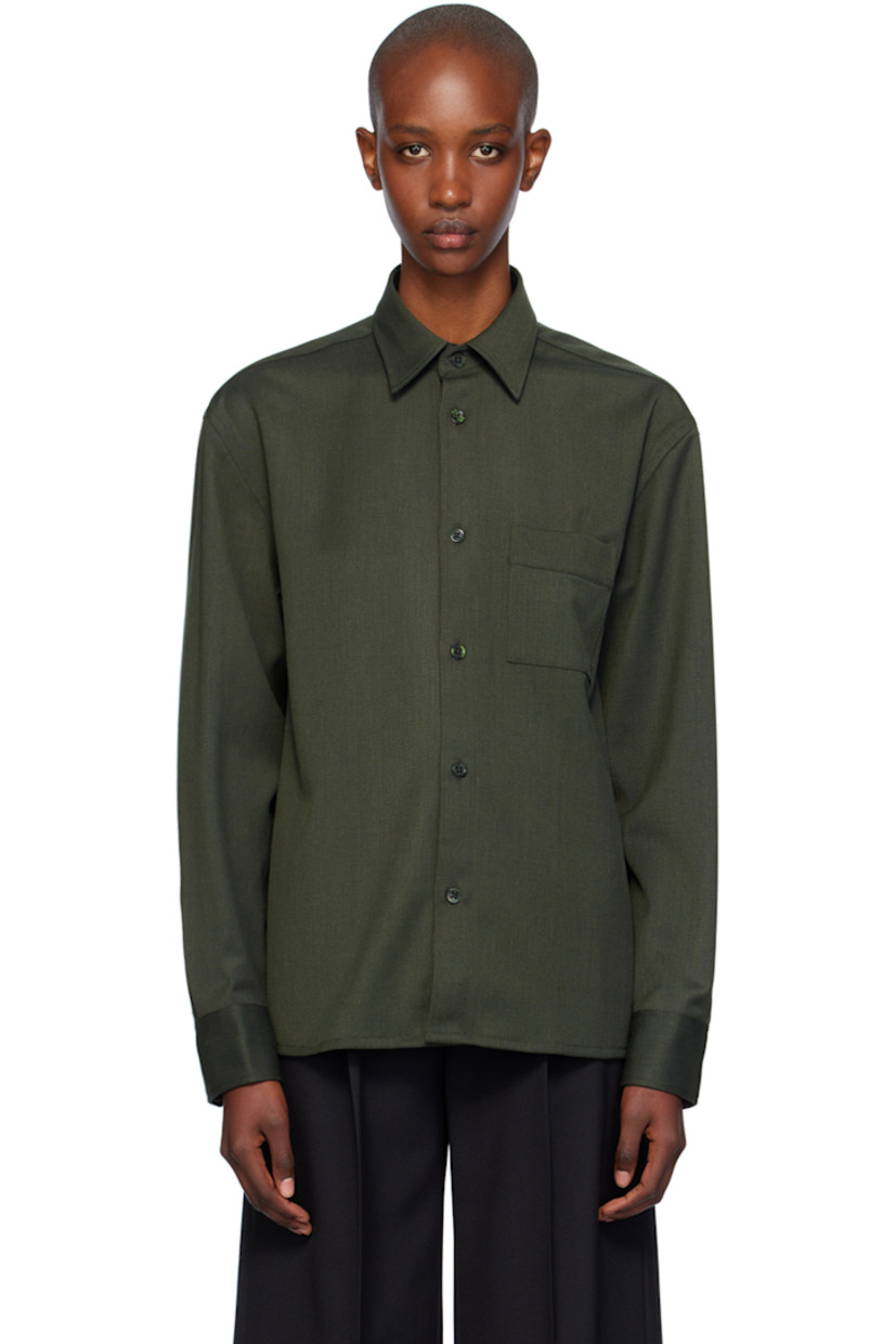 Stretch polyester- and merino wool-blend cavalry twill shirt.

· Boxy-fit
· Spread collar
· Button closure
· Patch pocket
· Adjustable single-button barrel cuffs
· Locker loop at back yoke

Supplier color: Green melange