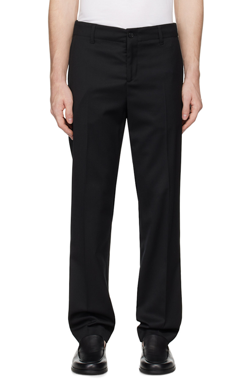Slim-fit and tapered stretch polyester- and wool-blend twill trousers.

· Mid-rise
· Belt loops at elasticized waistband
· Four-pocket styling
· Zip-fly
· Creased legs

Supplier color: Black