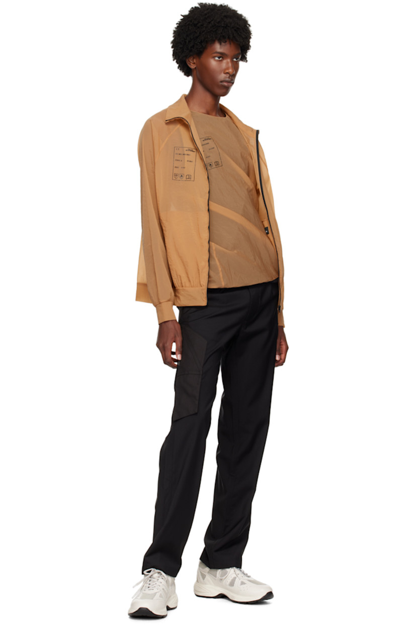 Sheer coated nylon organza jacket.

· Stand collar
· Logo printed at chest
· Zip closure
· Welt pockets
· Raglan sleeves

Supplier color: Champagne