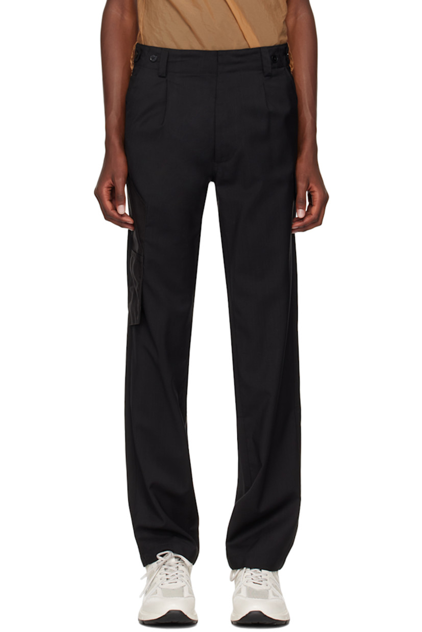 Semi-sheer woven wool and Cordura® nylon organza cargo pants.

· Paneled construction 
· Belt loops
· Button tabs at waistband
· Three-pocket styling
· Zip-fly
· Cargo pockets at leg

Supplier color: Black/Champagne