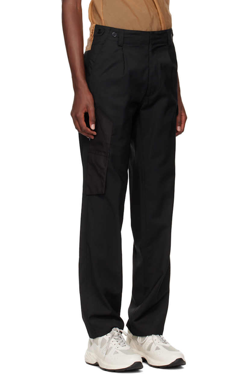 Semi-sheer woven wool and Cordura® nylon organza cargo pants.

· Paneled construction 
· Belt loops
· Button tabs at waistband
· Three-pocket styling
· Zip-fly
· Cargo pockets at leg

Supplier color: Black/Champagne