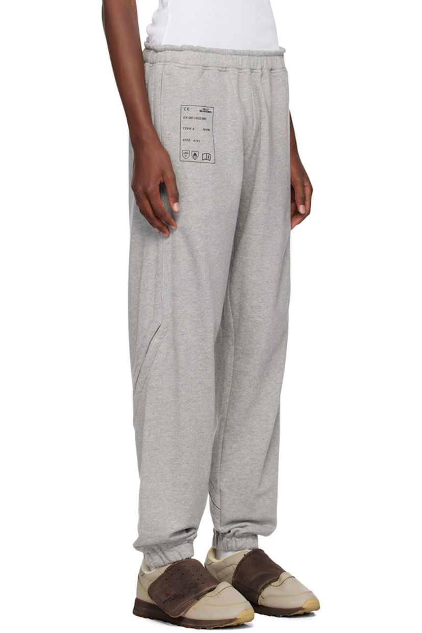 French terry sweatpants.

· Concealed drawstring at elasticized waistband
· Two-pocket styling
· Logo graphic printed at front
· Elasticized cuffs
· Exposed gusset at outseams  

Supplier color: Grey