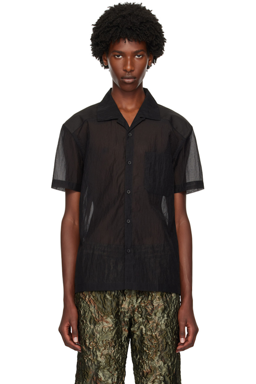 Sheer CORDURA® nylon ripstop and canvas shirt. 

· Paneled construction 
· Button tab at open spread collar 
· Button closure
· Patch pocket
· Logo embroidered at back collar
· Logo patch at back yoke

Supplier color: Black